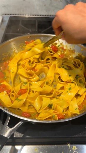 This Pasta with ginger, tomatoes, and turmeric is one of my go to comfort meals and I’m finally sharing the recipe ! What you’ll need: 6 oz. Pappardelle pasta cooked al dente & cooking water reserved 1 tbsp oil 1 tbsp butter 1/2 Serrano chili finely diced 1/2 tsp cumin seeds 12 cherry tomatoes , quartered 1.5 tsp ginger, grated 1/2 tsp turmeric powder 1/2 tsp salt (or as needed) Start by adding oil and butter to a pan over medium high heat, followed by cumin seeds and diced green chilis. Add in 