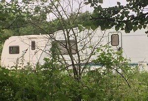 Caravan fire at site of controversial encampment