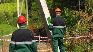 Installation of overhead power lines. Maintenance of overhead power lines. Electricians replace the cable.