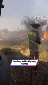 Brave leader guides junior firefighter during Limache forest fire