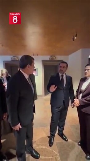 Mazloum Abdi and Asaad al-Shaibani share a cordial exchange on the sidelines of the Munich conference. | Channel 8 English