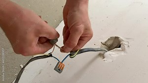 connecting wires to the connector. electrical wiring repair