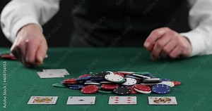 Poker player pulling in a pile of chips, large win, jackpot, successful game. Fortune, luck, gambling . Successful player stacking his chips on the poker Stock Video