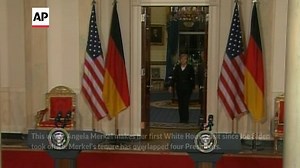 From back rubs to snubs, Merkel and 4 Presidents