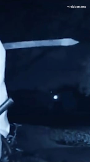 A doorbell cam captured a man creeping around a porch at night. He's armed with a sword, axe, and hammer. | Slapped Ham