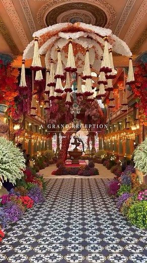 Interflora India on Instagram: "Welcome to a celebration that redefined grandeur. For this reception in Pune, we set out to create more than just decor—we brought to life a Palace of Dreams. Spanning over 1,10,000 sq ft, the venue was transformed into a majestic landscape with palace-high walls, jewel-toned florals, and awe-inspiring installations. From towering peacocks and elephants adorned in intricate floral and jewel detailing, to cascading floral tassels and lush landscaped blooms—every co