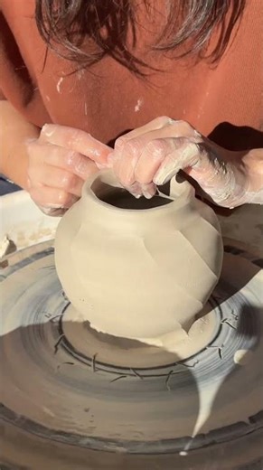 still playing with a cheese slicer at the pottery wheel