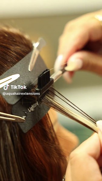 💡✨ Discover why V Light by AQUA Hair Extensions can add some serious edge to your service list! Here are just 4 of the many benefits: 1. Versatility: V Light can be applied anywhere on the head, including challenging areas like the face frame. This flexibility allows for creative styling options and personalized looks that meet your clients' unique needs. 2. Ideal for Fine Hair: The virtually undetectable bond is perfect for clients with see-through or super fine hair. This method provides a na