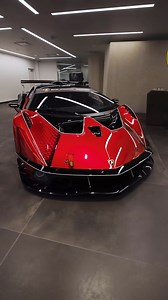 The Lamborghini Essenza SCV12 in Rosso Efesto exterior and 1 of 1 Rosso Carbon One of only 40 examples of the track-only Lamborghini Essenza SCV12 is currently on display at @lamborghinisaltlakecity, and it boasts a stunning configuration. Finished in red, the bold color is paired with black, and featured in painted panels and in tinted exposed carbon fiber, perfect for evoking the formidable racing ability that the Essenza SCV12 possesses. Learn more: https://bit.ly/485J7Kk | duPont REGISTRY