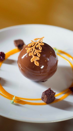 Your journey to an extraordinary sweet experience begins at Pan Asian. Treat yourself to our delectable Chocolate Sphere– a delicacy designed to bring a smile with every bite. To relish this sweet escape firsthand, please call 044 222 00000. { PanAsian AsianCuisine OrientalCuisine Chocolate Dessert AsianFood Culinary Experience ChocolateSphere SweetTooth ChocolateDessert} #ITCGrandChola #ITCHotels #ResponsibleLuxury #LuxuryHotels #Chennai | ITC Grand Chola, Chennai