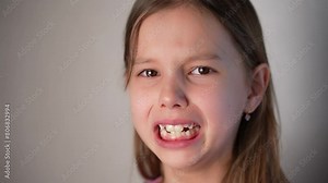 Close up upset cute girl looking sad crying on camera