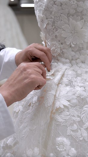 Unveiling the Bridal Spring 2024 collection brings the meticulous #ZMSavoirFaire process to life. Floral motifs grace the intricate beading, adorning this ethereal lace dress with abundance. Corded lace and appliqués enhance full ball gowns, while delicate Chantilly lace hosts blooming 3D flowers in a flourish of artistry. #ZuhairMuradMariage #ZuhairMurad | ZUHAIR MURAD