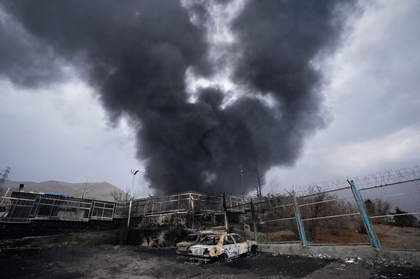 'Black rain' creates health, environmental risks as toxic smoke billows from bombed Iran oil depots