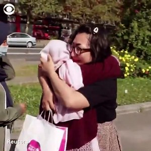 REUNITED: Shakiba Dawod embraces her mother, Qadira, in France after arriving with other family members on an evacuation flight out of Kabul. It's the first time they've been reunited in 12 years. | CBS Evening News