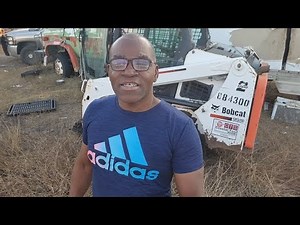 Bobcat T450 Skid Steer bucket tilt cylinder removal disassembly and rebuild