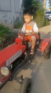 A 53-year-old grandpa made this mini tractor for his grandson as a toy. The boy is nuts about tractors. To keep him safe, the creative grandpa made the one-of-a-kind toy for him. | China Plus Culture