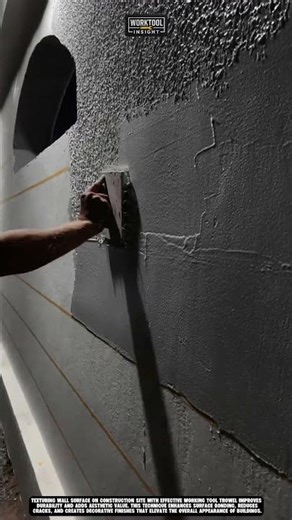 Texturing wall surface on construction site with effective working tool trowel