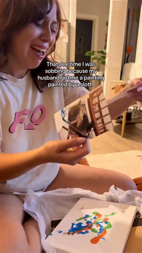 Lina Light on Instagram: "Can you tell I’m an empath? 😭 #christmasgift #sloth #surprisegift"