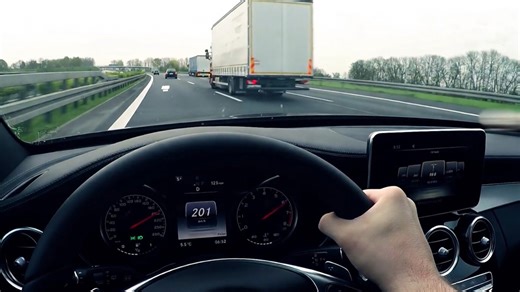 POV driving Mercedes AMG C450 at full speed on Autobahn highway