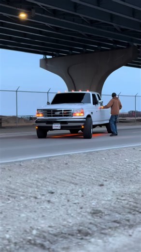 Street tractor meets big city#obspowerstroke #oldschoolcool #73powerstroke #legendsneverdie #obs #fypage #streettractor #7three