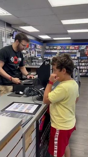 Nintendo Switch – OLED Model w/ Neon Red & Neon Blue Joy-Con. He got it on his saving