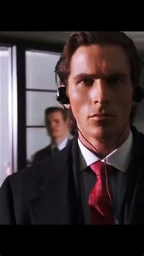 Patrick bateman walking into office