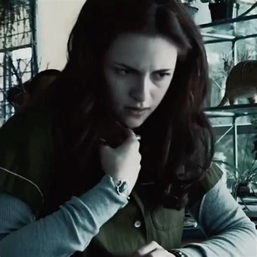 films and tv❣️ on Instagram: "Twilight introduces Bella and Edward as two people orbiting loneliness long before they ever meet. Bella arrives in Forks feeling out of place in her own life, detached from school, family, and the expectation that she should fit somewhere. Edward exists in constant restraint, surrounded by people yet isolated by what he is. Their connection forms in glances, silence, curiosity, and an almost magnetic pull neither fully understands. What begins as intrigue quickly b