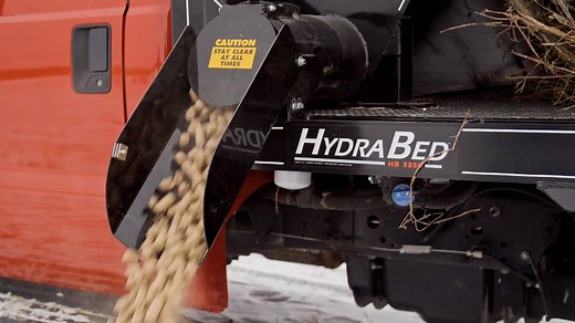 HydraBed® The original fully integrated bale handler 🌅🚜 It gives you fingertip control, automatic arm sync, and SureStop™ precision. Power, speed, and safety all in one smooth motion. | Triple C, Inc / Hydra Bed