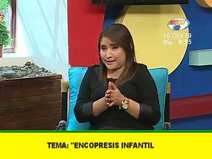 What is childhood encopresis and what are its causes?