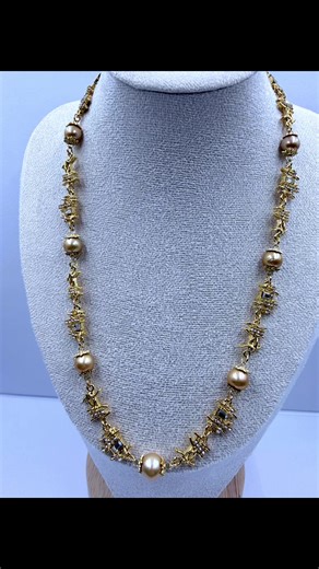 Golden Bough—Pearl Collection This handcrafted set features unique golden cultured pearls with intricately designed, branch-like settings. Each setting is plated with rich 18K gold and delicately set with sparkling crystals, creating a striking contrast. The organic, sculptural design of the necklace is the centerpiece, complemented by matching earrings. A perfect blend of natural inspiration and modern luxury for a bold, elegant statement. · Material: Golden Cultured Pearls, 18K Gold Plated Bra