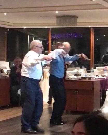Elderly Men Showcase Energetic Dance Performance