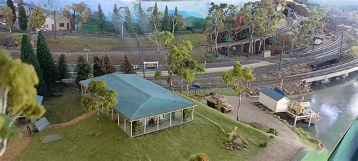 Candy 4438 and a rather sooty red terror 4469 haul their steel train round the bend and through Jerrom's Creek on the goods line as candy 4496 passes by on the mainline with an express that will also be blowing straight through the Creek. 4496 is fitted with a hardwired Soundtraxx DCC decoder, sound and speaker package from DCC Solutions, whilst 4469 is fitted with ESU LokSound V3... 4438 has a non-sound LokPilot V5 decoder fitted. The steel train consists primarily of BDL/BDY type 46ft open wag