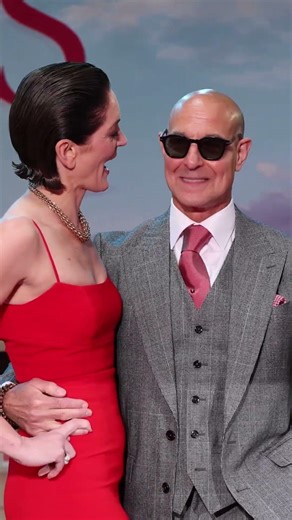 Stanley Tucci locks lips with wife Felicity Blunt, cracks up in rare red carpet PDA