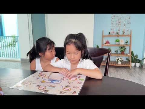 Tiếng Anh Phan Thiết: Elsa and Ruby practice reading from exercise and talking about At School