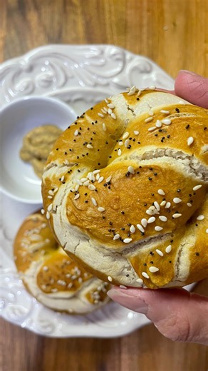 Elisa on Instagram: "Fresh, chewy, and golden brown ✨ These homemade pretzels are soft on the inside with just the right bite on the outside. Mixed, kneaded, and ready to roll thanks to my @nutrimill Bosch White Universal Plus Stand Mixer! Boiled, sprinkled with sesame + poppy seeds, and baked to perfection 🥨💛 What’s your favorite pretzel topping—classic salt, cheesy, or something sweet? 👇🏻 ✨🛒 Shop NutriMill through my Linktree and use VCF for $20 off selected collections! FOLLOW @vermont_c