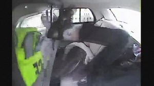 Chilling dash-cam video shows prisoner flying out the rear window