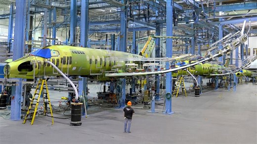 The construction process of costly private jets in contemporary manufacturing facilities