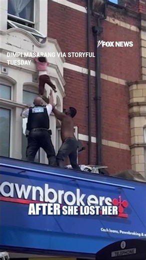 SEE IT: Man makes life-saving catch as London girl dangles from balcony #shorts