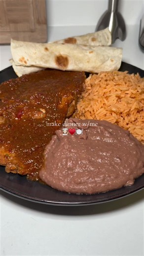 Pork chops in salsa w/rice & beans 🔥 #porkchops #mexicanrice #beans #dinner #fyp
