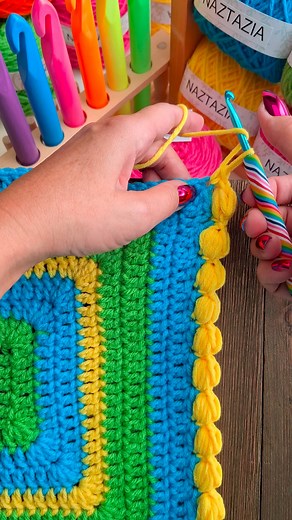 Crochet bubble edge, in this tutorial from Naztazia, starts by drawing up 7 loops, making a yarn over, a chain, then a single crochet 3 stitches over for this border. #reels #crochet #knitting #artist #yarn #makersgonnamake #crochetblanket #crocheting #knittinginspiration #tutorial #naztazia | Naztazia