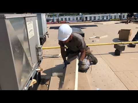 Installing Poly Iso Insulation and Sopraboard -- Soprema Commercial Roofing
