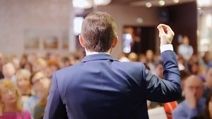 A Man Talking On Stage Giving Lecture To Stock Footage SBV-333623813 - Storyblocks
