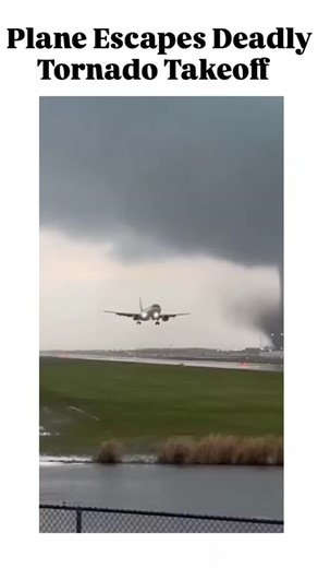 its_trand on Instagram: "The dramatic video captures a tense moment at an airport runway under ominous, swirling dark skies. A large commercial airplane—likely an Airbus or similar wide-body jet—powers down the runway for takeoff, its landing lights piercing through the gloom as it lifts off smoothly. In the immediate background, a massive, churning wall of clouds and debris forms what appears to be a tornado or intense rotating storm system, dangerously close to the aircraft's path.The contrast