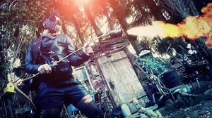 Download tank girl posing with burning flamethrower for free