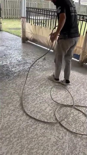 spray deck with flagstone pattern on patio