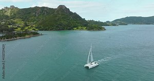 Aerial: Sailing in ocean at Whangarei heads, Northland, New Zealand