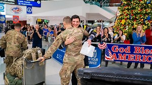 Welcome home: Community, family members greet military at airport