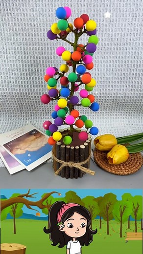 Paper Craft Ideas on Instagram: "Create your very own beautiful clay tree with just a few simple materials! Start by cutting a plastic bottle in half and gluing small wooden sticks around its sides using hot glue for a natural bark-like texture. Next, roll small clay balls and fill the bottle with clay to provide a solid base. For the final touch, attach your clay balls to a grape stem, mimicking the look of leaves or fruits. Once complete, you’ll have a unique, handmade clay tree that’s perfect