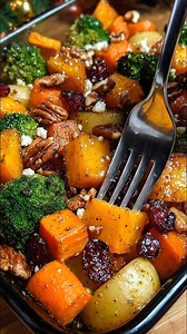 This might be the best side dish you'll see all year. 👀 Imagine tender, sweet Caramelized Butternut Squash, Carrots, Broccoli, and Yukon Potatoes tossed with crunchy pecans, tangy feta, and sweet cranberries, all coated in an irresistible honey glaze. What main course would this be PERFECT with? Check the recipe in the FIRST COMMENT 👇 | World Recipes