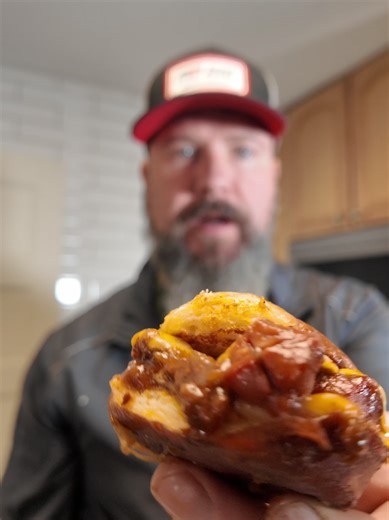 Chili dog sliders done right! All-beef hot dogs tucked into soft, salty-sweet King's Hawaiian Pretzel Slider Buns, topped with hearty, meaty chili and a generous layer of melty cheese. The pretzel buns bring that perfect chew and buttery finish that takes these sliders to another level. Game day ready, backyard approved, and guaranteed to disappear fast. #sliders #lunch #snack #goodstuff #kingshawaiian @KING’S HAWAIIAN @SLOTDOG @Blackstone Griddles